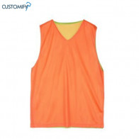 Pitrall reversible, 100% poliester taronja / verd fluor CH Sant Andreu